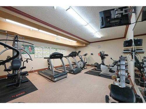 126-5300 48 Street, Red Deer, AB - Indoor Photo Showing Gym Room