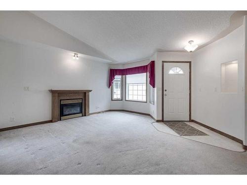 11 Westin Place, Sylvan Lake, AB - Indoor With Fireplace