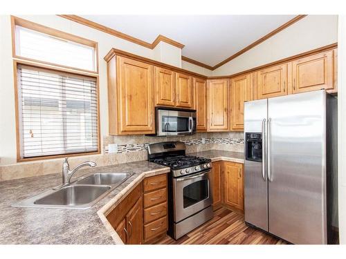 5027-25054 South Pine Lake Road, Rural Red Deer County, AB - Indoor Photo Showing Kitchen With Stainless Steel Kitchen With Double Sink