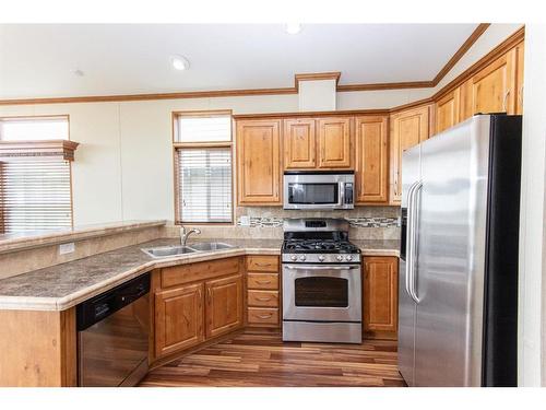 5027-25054 South Pine Lake Road, Rural Red Deer County, AB - Indoor Photo Showing Kitchen With Stainless Steel Kitchen With Double Sink