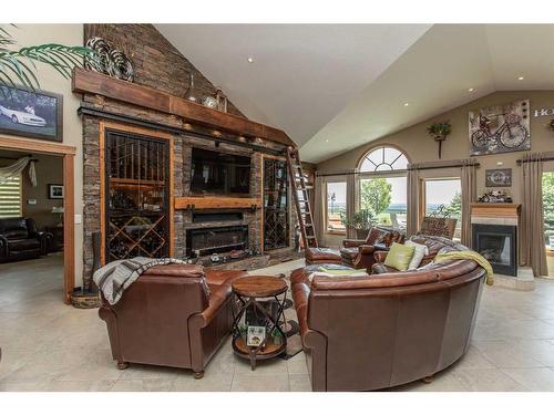 38423 Range Road 282, Rural Red Deer County, AB - Indoor Photo Showing Living Room With Fireplace