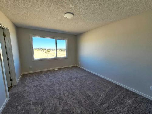 36 Key Cove Sw, Airdrie, AB - Indoor Photo Showing Other Room