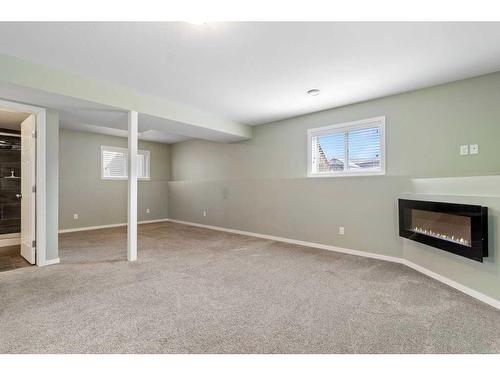 167 Timberstone Way, Red Deer, AB - Indoor With Fireplace