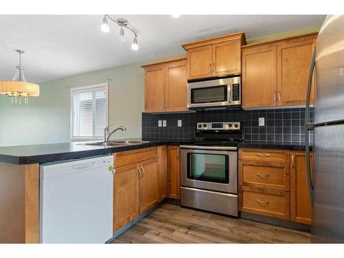 167 Timberstone Way, Red Deer, AB - Indoor Photo Showing Kitchen With Double Sink