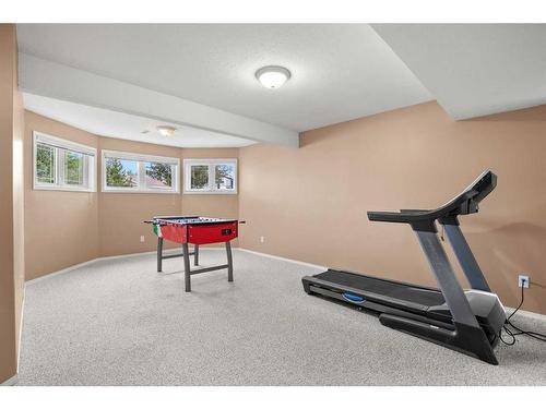 32 Fern Glade Crescent, Sylvan Lake, AB - Indoor Photo Showing Gym Room
