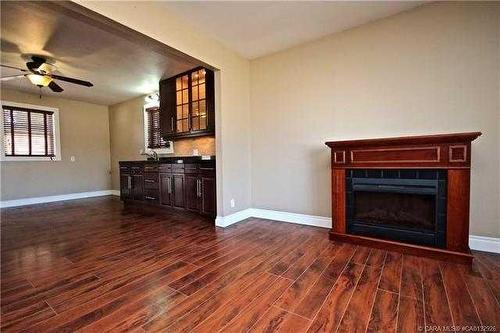 5005 54 Street, Killam, AB - Indoor Photo Showing Living Room With Fireplace