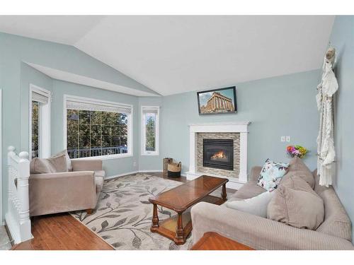 46 Westwood Crescent, Sylvan Lake, AB - Indoor Photo Showing Living Room With Fireplace