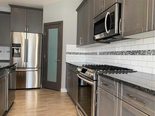 142 Connaught Crescent, Red Deer, AB - Indoor Photo Showing Kitchen With Stainless Steel Kitchen With Upgraded Kitchen