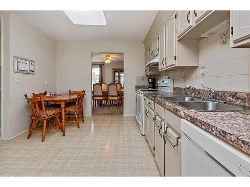 10 Mclevin Crescent, Red Deer, AB - Indoor Photo Showing Kitchen With Double Sink