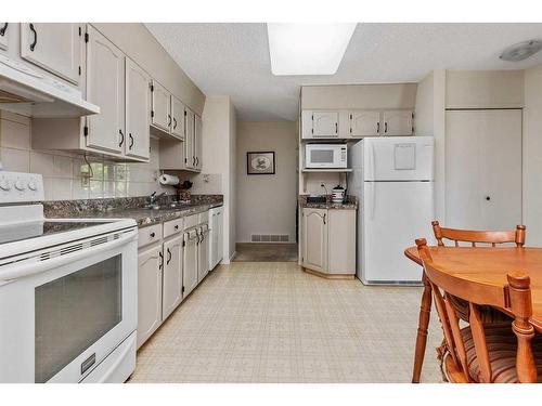 10 Mclevin Crescent, Red Deer, AB - Indoor Photo Showing Kitchen