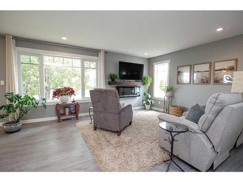 5818 41 Street Crescent, Red Deer, AB - Indoor Photo Showing Living Room With Fireplace