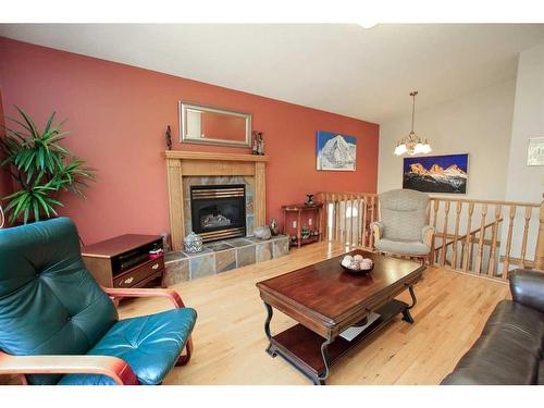 4631 48 Street, Red Deer, AB - Indoor Photo Showing Living Room With Fireplace