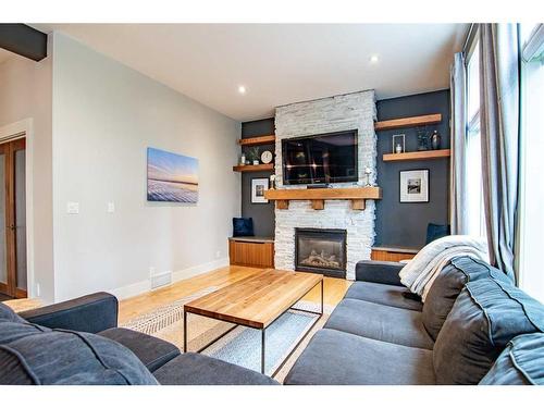 115 Issard Close, Red Deer, AB - Indoor Photo Showing Living Room With Fireplace