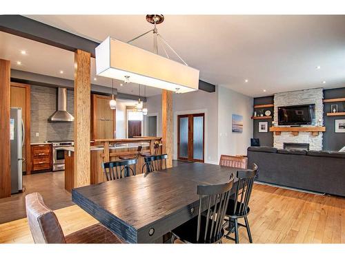 115 Issard Close, Red Deer, AB - Indoor Photo Showing Dining Room With Fireplace