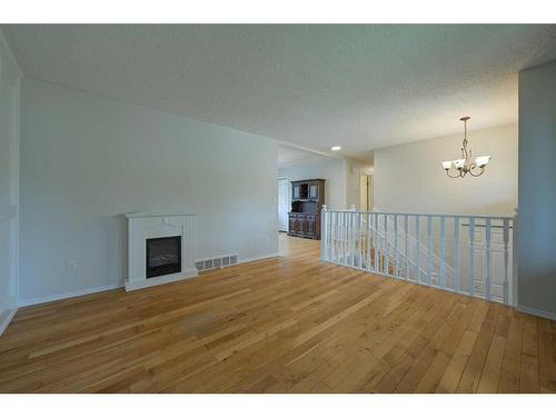 27 Barner Avenue, Red Deer, AB - Indoor With Fireplace