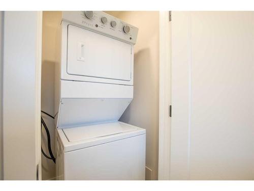 27 Gray Close, Sylvan Lake, AB - Indoor Photo Showing Laundry Room