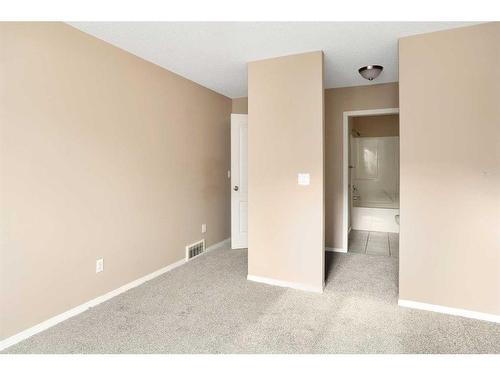 203-5220 50A Avenue, Sylvan Lake, AB - Indoor Photo Showing Other Room