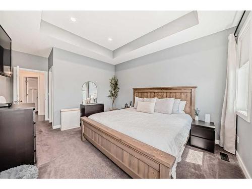 9 Bowman Circle, Sylvan Lake, AB - Indoor Photo Showing Bedroom