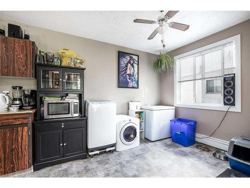 101-304-6821 59 Avenue, Red Deer, AB - Indoor Photo Showing Laundry Room