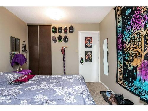101-304-6821 59 Avenue, Red Deer, AB - Indoor Photo Showing Bedroom