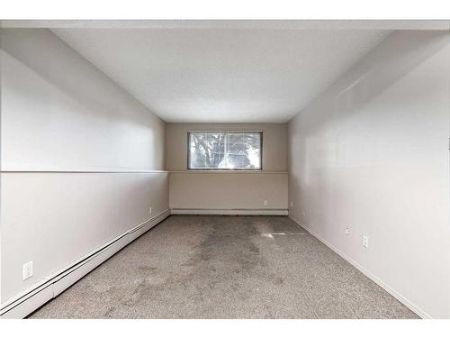 101-304-6821 59 Avenue, Red Deer, AB - Indoor Photo Showing Other Room