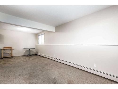 101-304-6821 59 Avenue, Red Deer, AB - Indoor Photo Showing Other Room