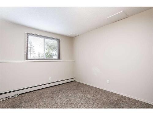 101-304-6821 59 Avenue, Red Deer, AB - Indoor Photo Showing Other Room