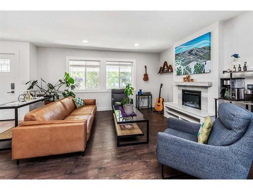 5 Mccune Avenue, Red Deer, AB - Indoor Photo Showing Living Room With Fireplace