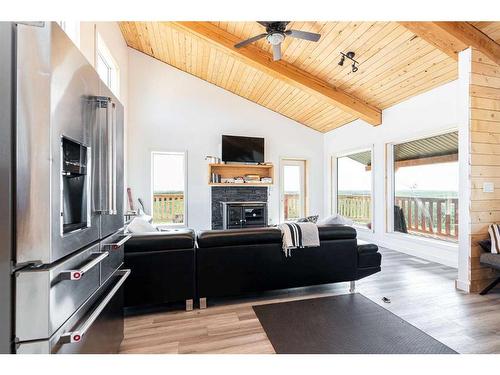 23307 394 Township Ne, Rural Lacombe County, AB - Indoor Photo Showing Living Room With Fireplace