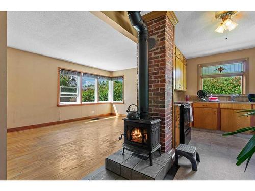 4328 37 Street, Red Deer, AB - Indoor With Fireplace
