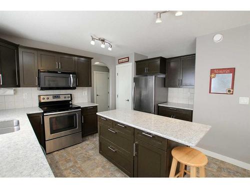 68 Lancaster Drive, Red Deer, AB - Indoor Photo Showing Kitchen With Double Sink