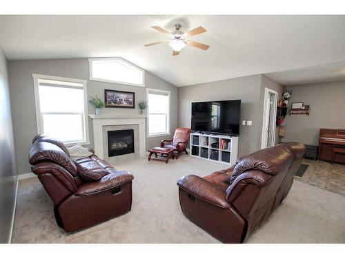 68 Lancaster Drive, Red Deer, AB - Indoor Photo Showing Living Room With Fireplace