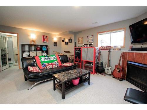 93 O'Brien Crescent, Red Deer, AB - Indoor Photo Showing Living Room With Fireplace
