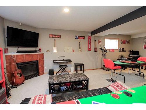 93 O'Brien Crescent, Red Deer, AB - Indoor With Fireplace