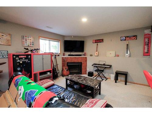 93 O'Brien Crescent, Red Deer, AB - Indoor With Fireplace