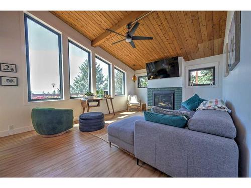 74-37535 Range Road 265, Rural Red Deer County, AB - Indoor Photo Showing Living Room With Fireplace