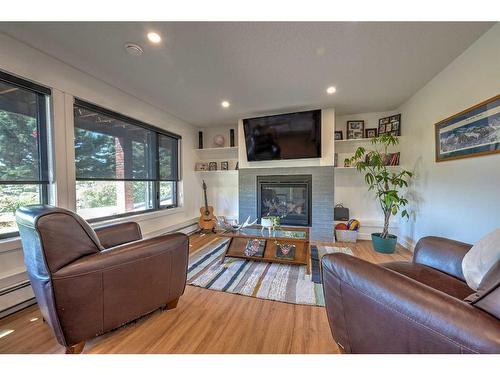 74-37535 Range Road 265, Rural Red Deer County, AB - Indoor Photo Showing Living Room With Fireplace