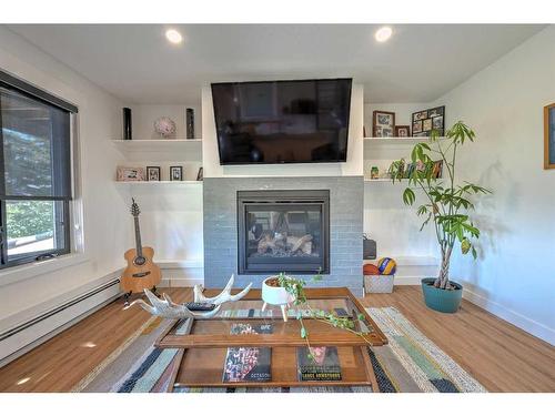 74-37535 Range Road 265, Rural Red Deer County, AB - Indoor Photo Showing Other Room With Fireplace