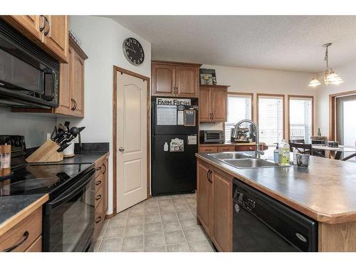 19 Jones Crescent, Red Deer, AB - Indoor Photo Showing Kitchen With Double Sink