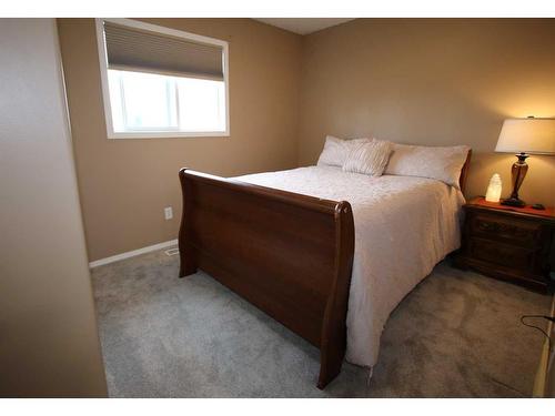 32 Arnold Close, Red Deer, AB - Indoor Photo Showing Bedroom