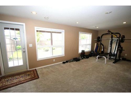 32 Arnold Close, Red Deer, AB - Indoor Photo Showing Gym Room