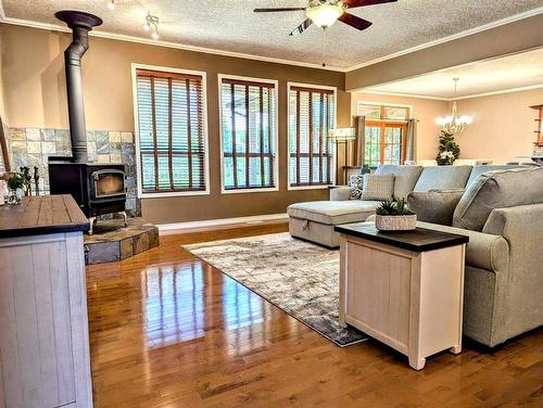 1865 Barton Drive Sw, Slave Lake, AB - Indoor Photo Showing Living Room With Fireplace