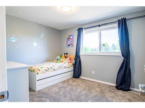 23 Allsop Avenue, Red Deer, AB - Indoor Photo Showing Bedroom
