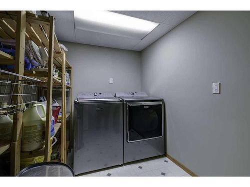 11 Glenbrook Place, Cochrane, AB - Indoor Photo Showing Laundry Room