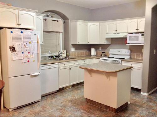 35 Adams Close, Red Deer, AB - Indoor Photo Showing Kitchen With Double Sink