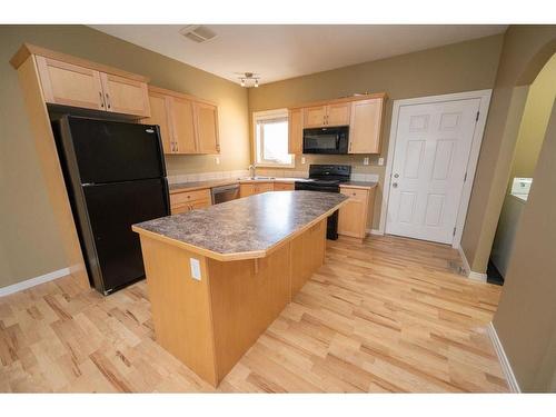 38-45 Ironstone Drive, Red Deer, AB - Indoor Photo Showing Kitchen With Double Sink