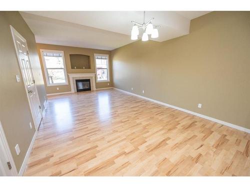 38-45 Ironstone Drive, Red Deer, AB - Indoor With Fireplace