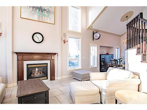 25 Ashmore Close, Red Deer, AB - Indoor Photo Showing Living Room With Fireplace