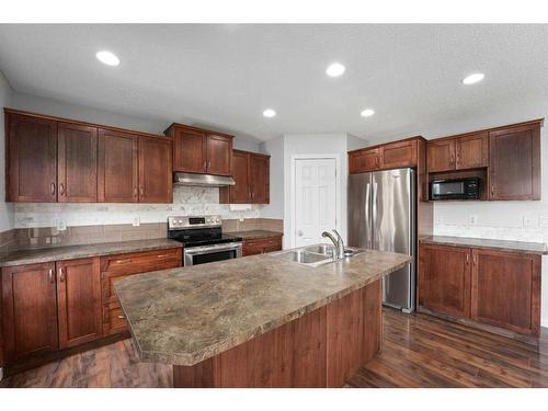 375 Prestwick Close Se, Calgary, AB - Indoor Photo Showing Kitchen With Stainless Steel Kitchen With Double Sink