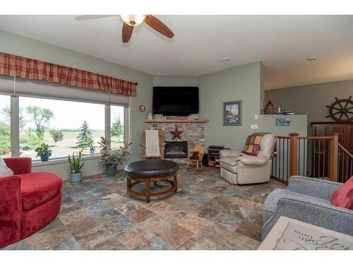 40511 Range Road 273, Rural Lacombe County, AB - Indoor Photo Showing Living Room With Fireplace